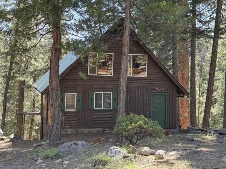Seasonal Mountain Getaway with Stone Fireplace | $69,000