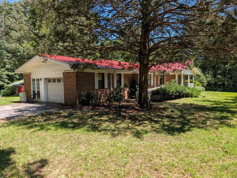 Auction: $1 l Classic 3-bedroom, 2-bath brick home