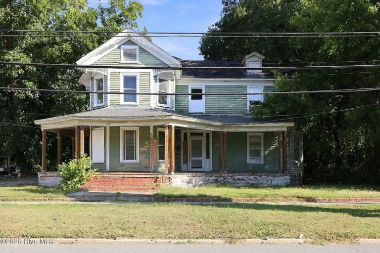 1905 Historic Home:  High Ceilings, 4 Fireplaces & Wrap-Around Porch | $79,000